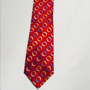 TURNBULL & ASSER RED CIRCLE PATTERN SILK TIE.